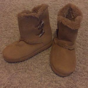 Slipper boots styled after UGG